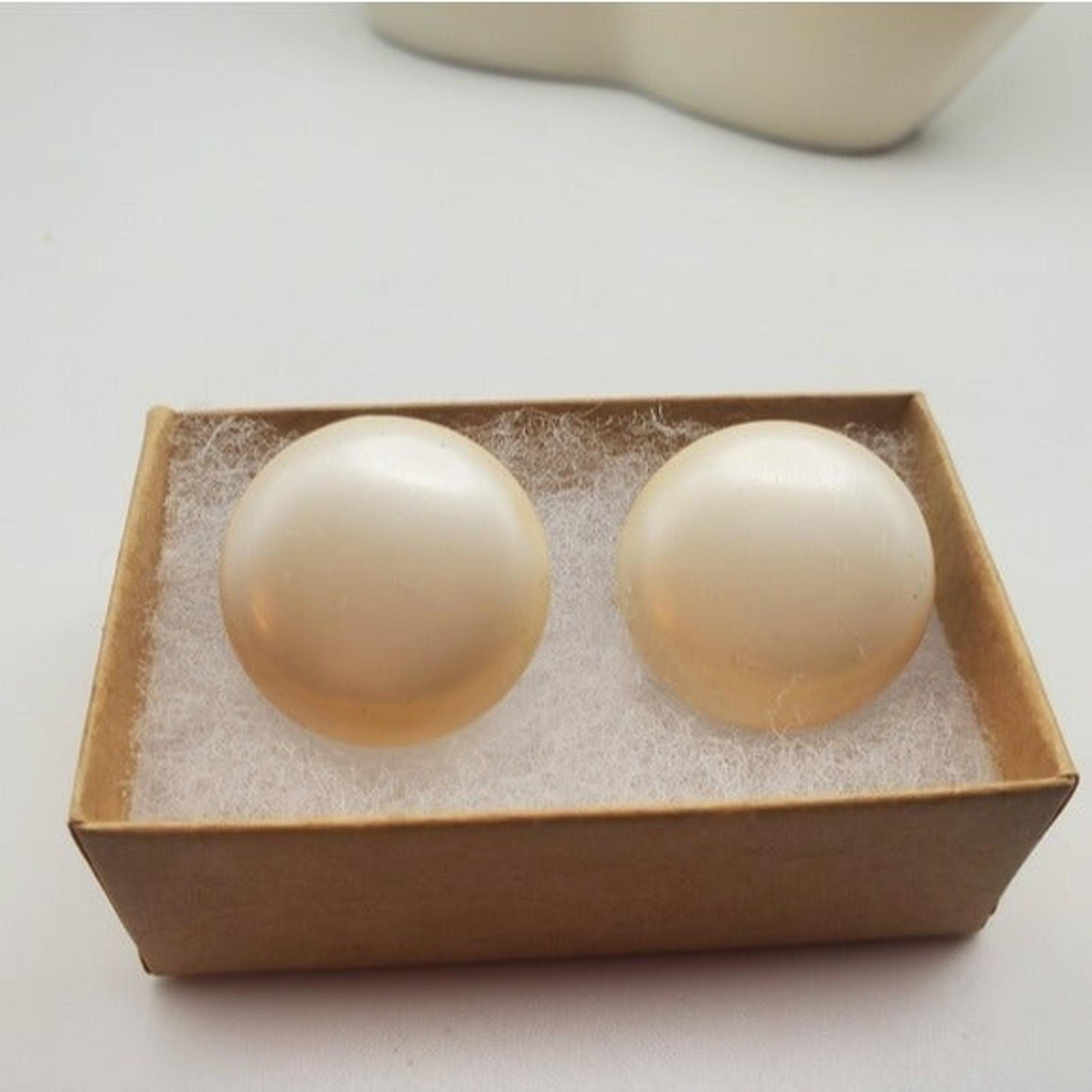 Estate saucer cream toned earrings clip on vintage
