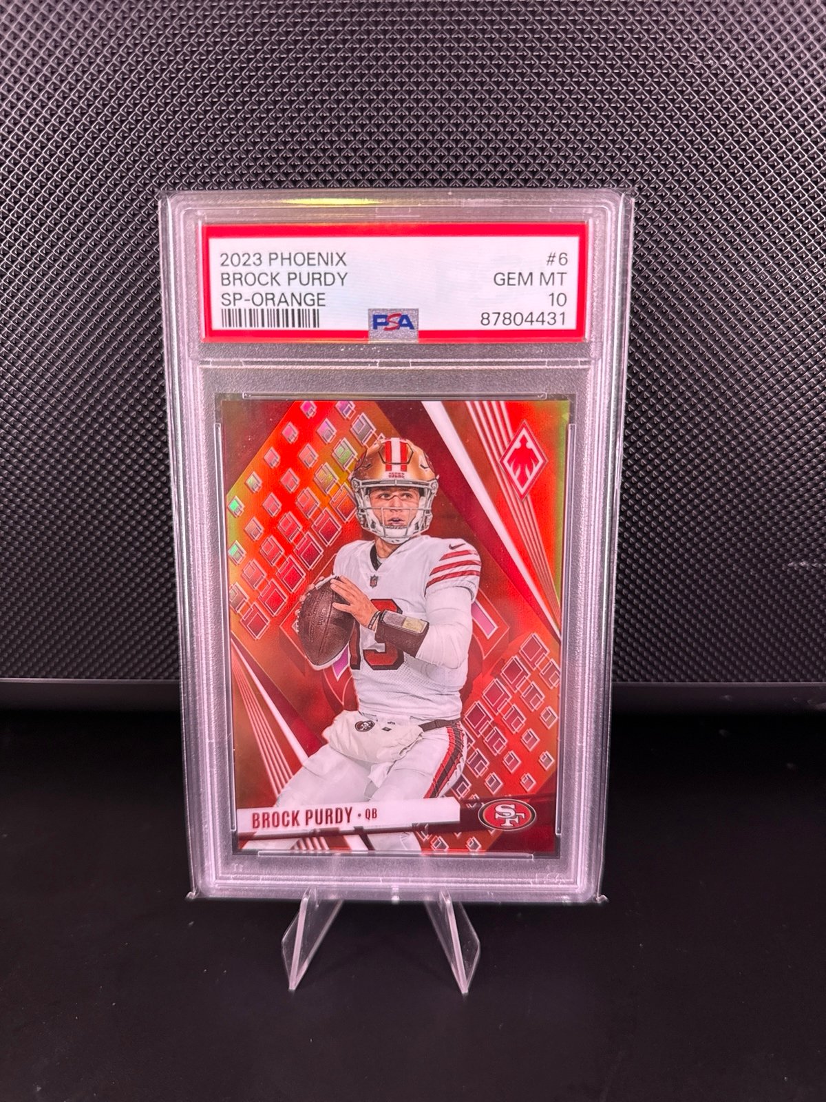 2023 Panini Phoenix Brock Purdy SP Orange /75 PSA 10