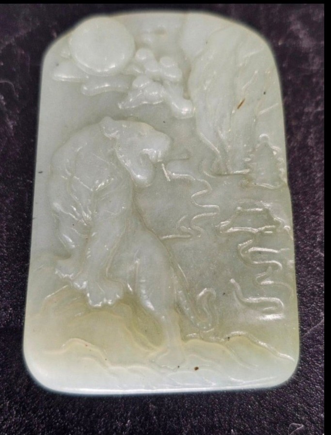 Vintage/antique hand carved jade pendant....