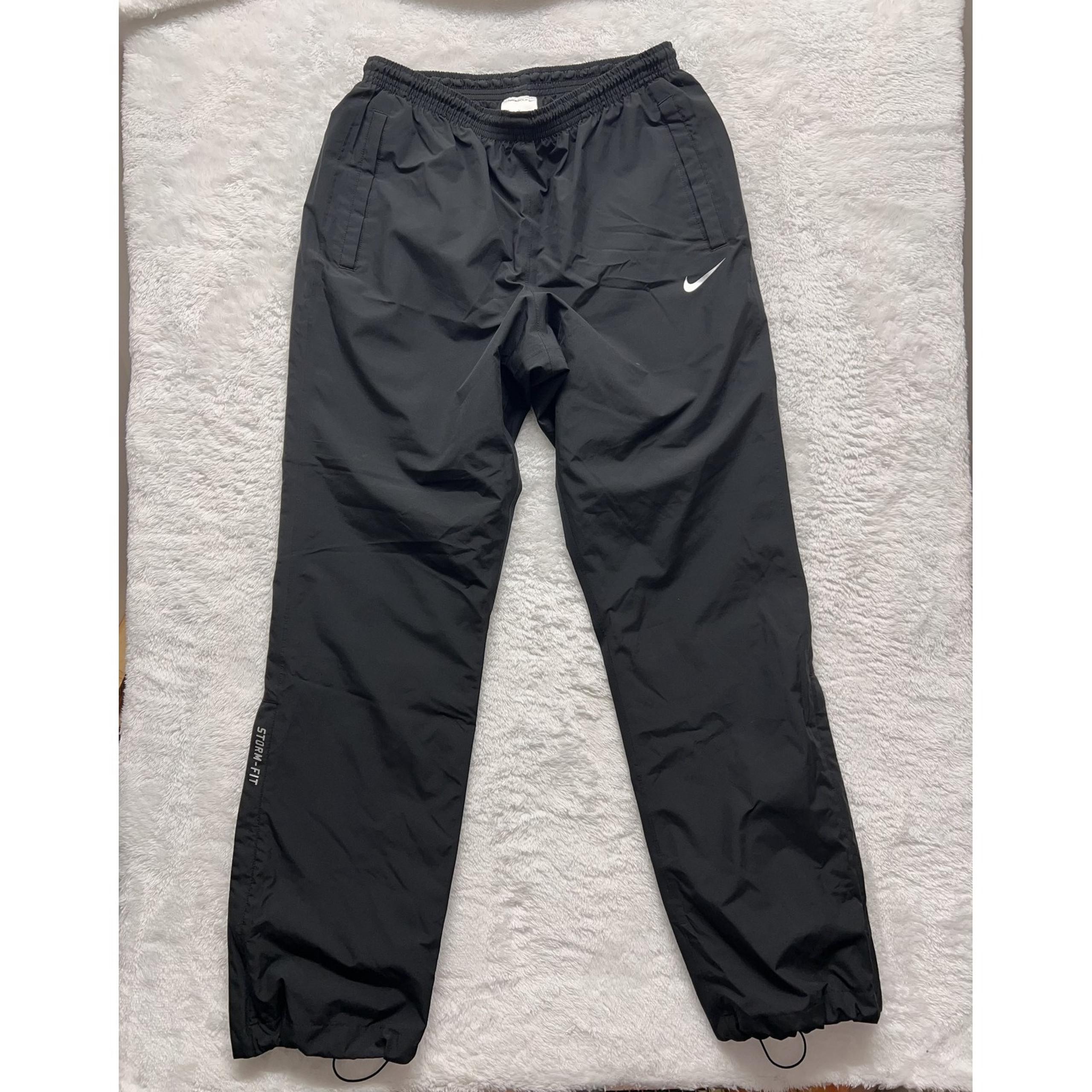 Nike Golf Storm-FIT Pants Mens Medium Black Waterproof Zip Leg Adjustable Cuffs