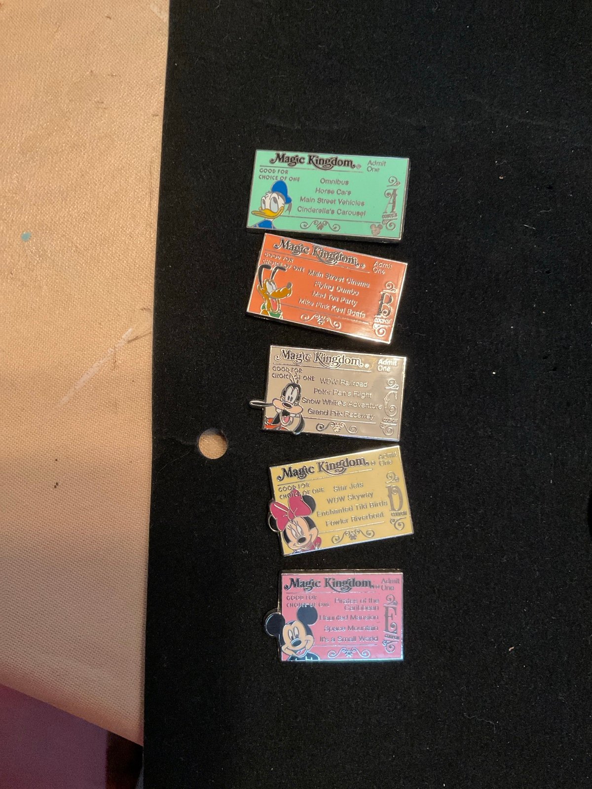 Disney park ticket pins