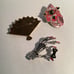 Lot of three pins