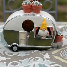 Super cute gareden gnome in camper bright and colorful birdhouse