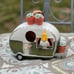 Super cute gareden gnome in camper bright and colorful birdhouse