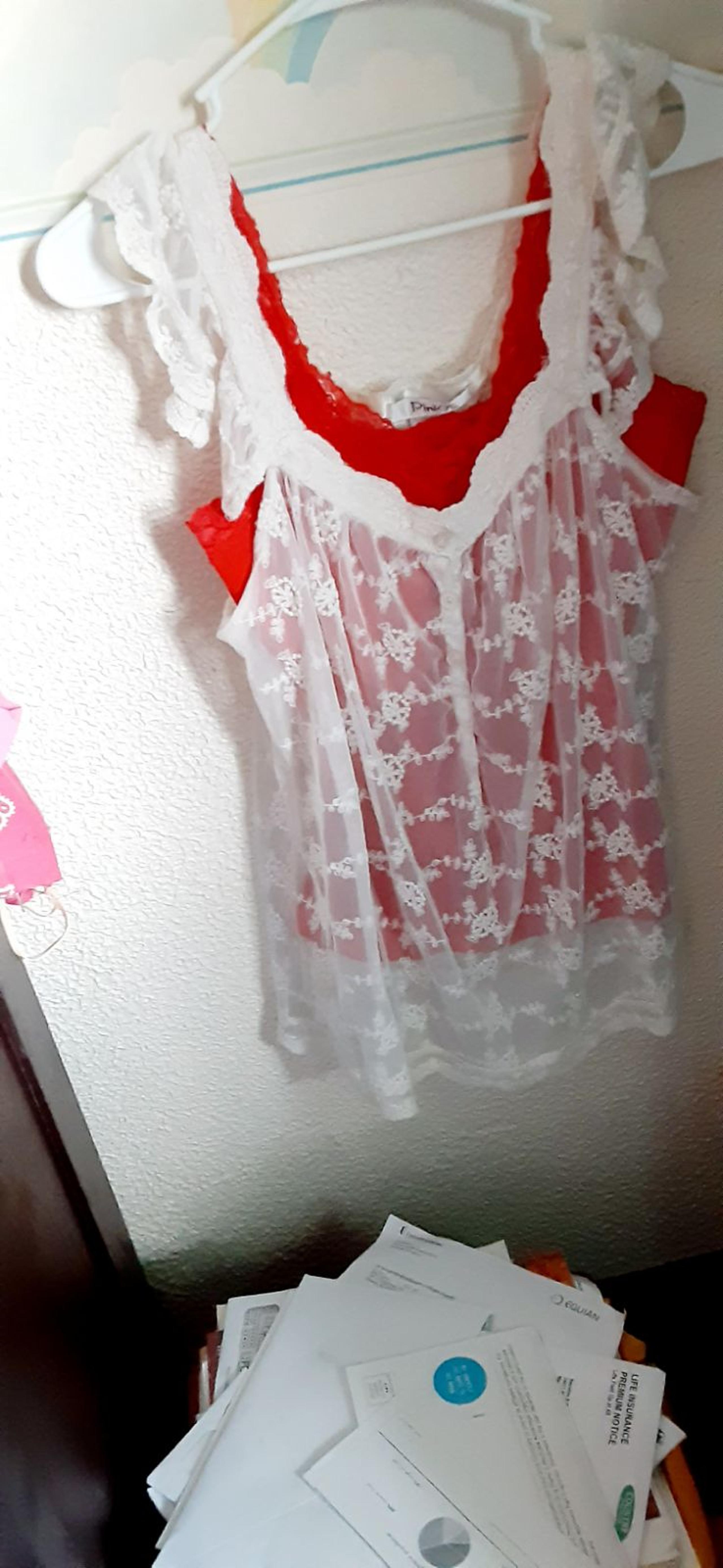 Super cute tank with shear cover.
