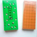 Brand new shogi board and beautiful shogi pieces (made of plastic).