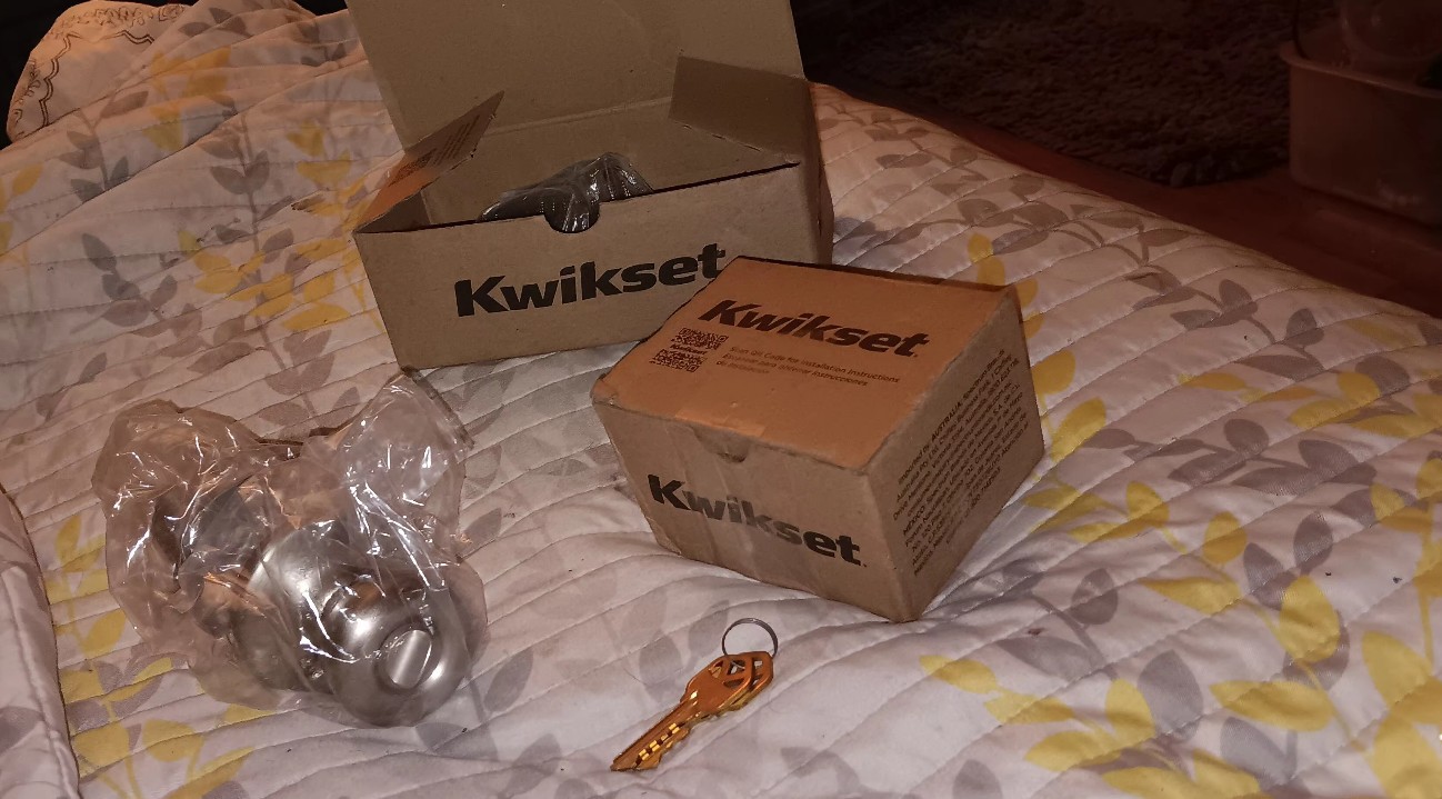 Brand new locks dead bolt and door knob with box and keys
