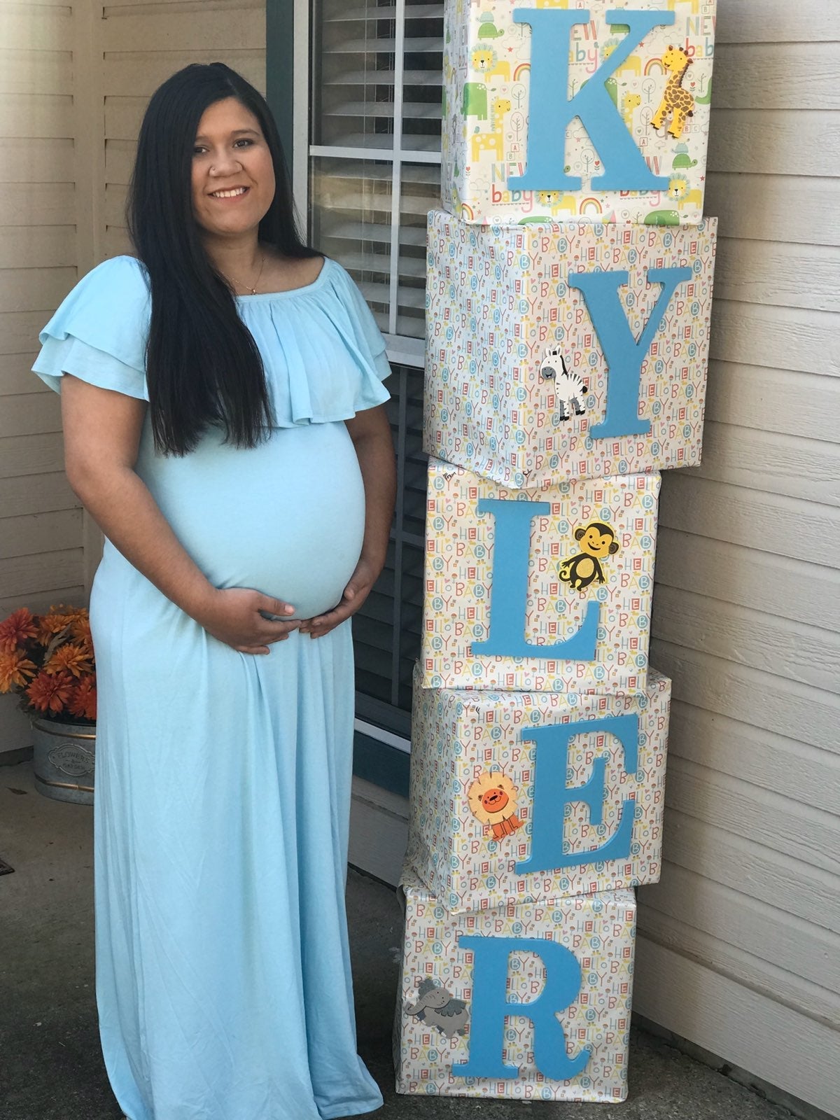 A powder blue maternity dress