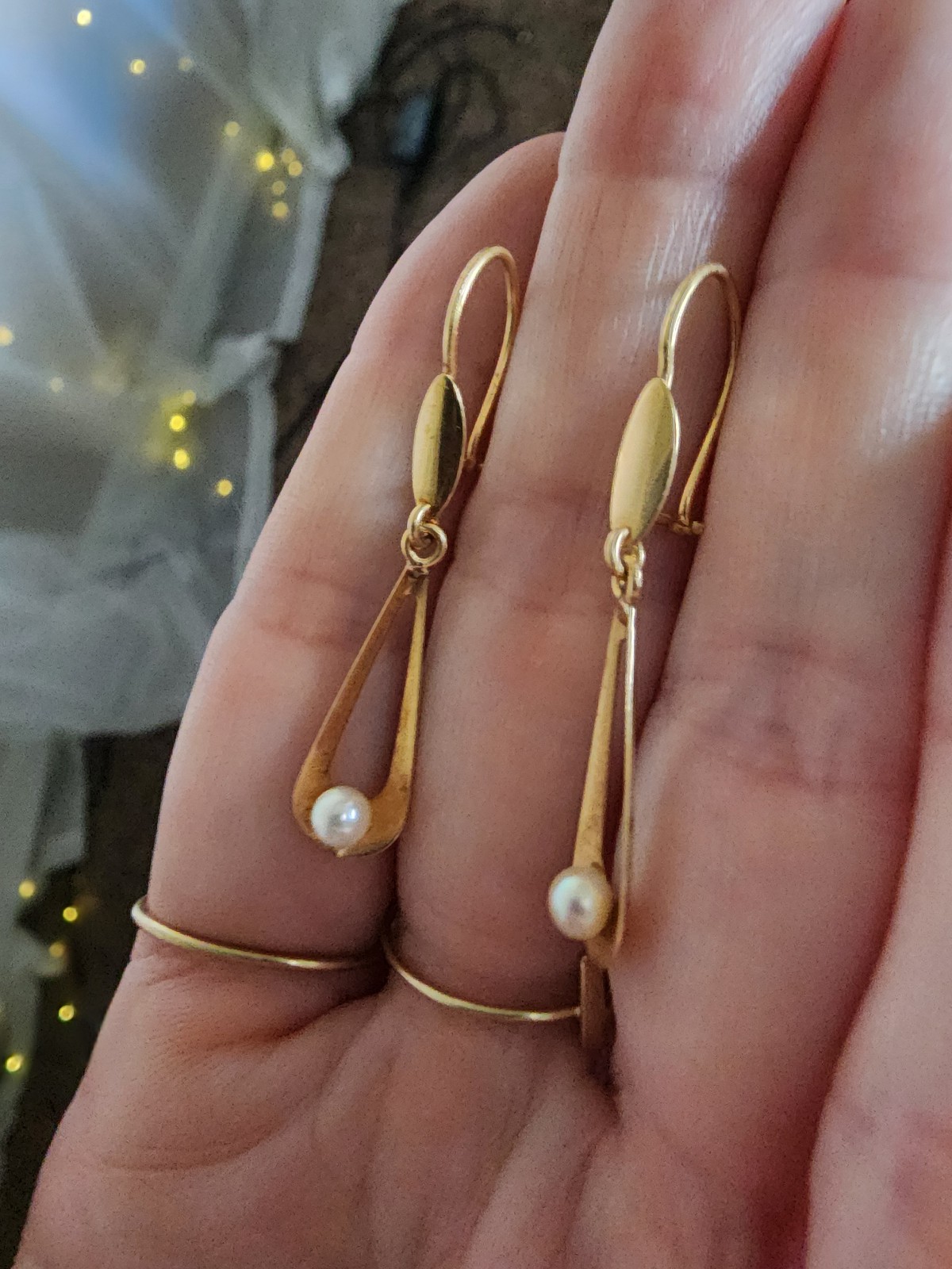 14k gold earrings with real pearls.