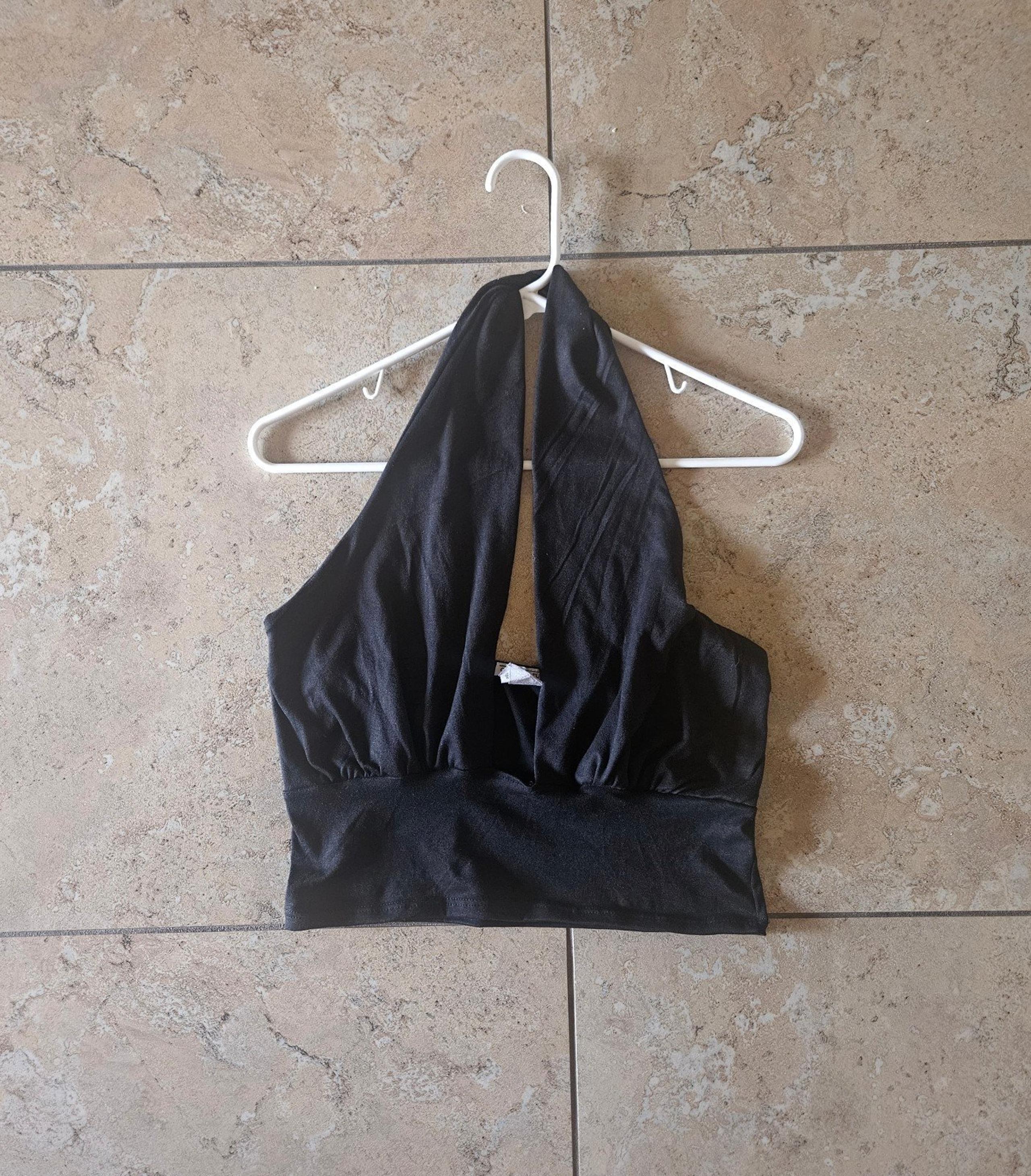 Charlotte russe black stretch halter crop top size Large with twist strap