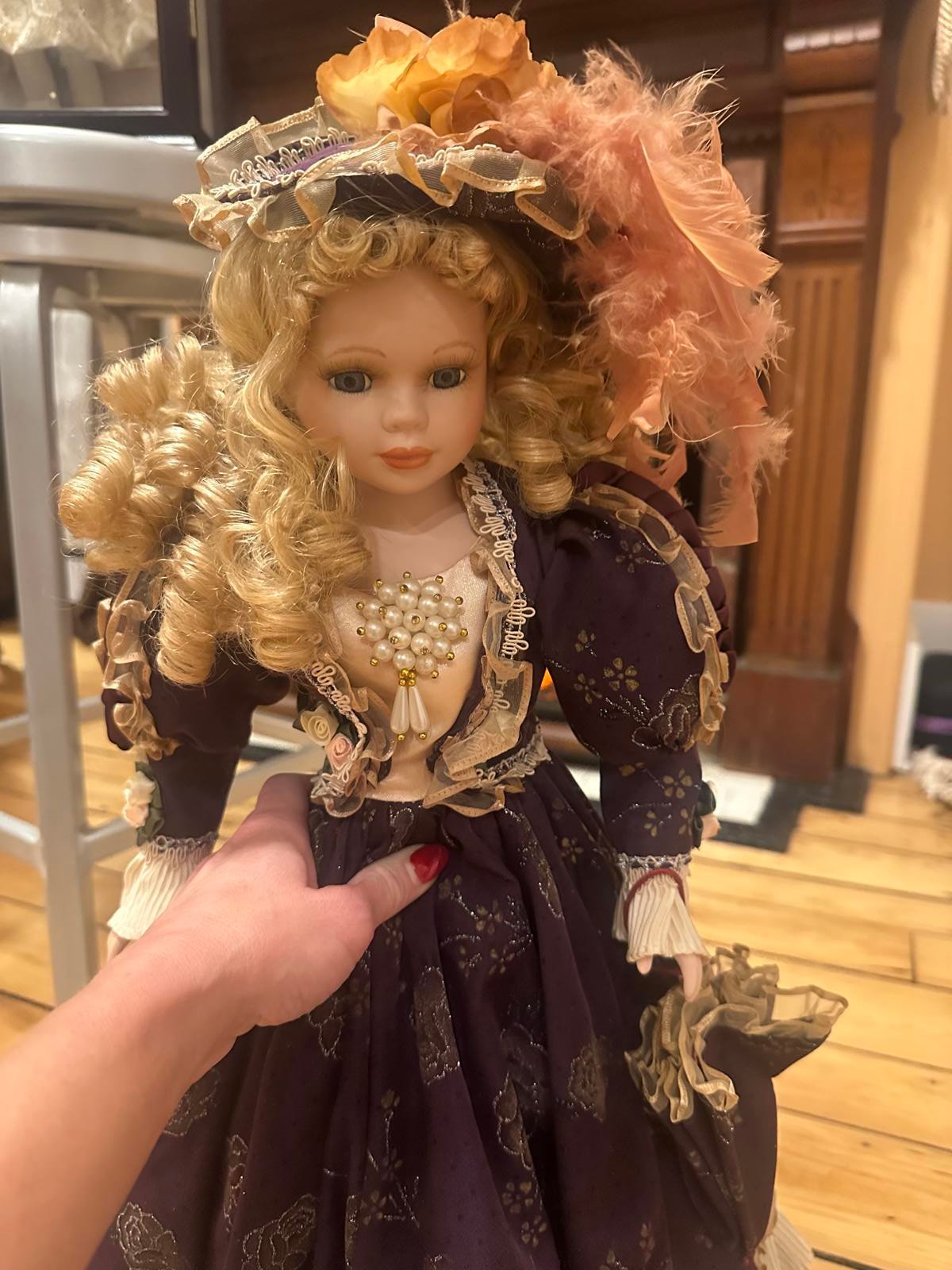 Elegant Victorian Porcelain Doll with Purple Dress