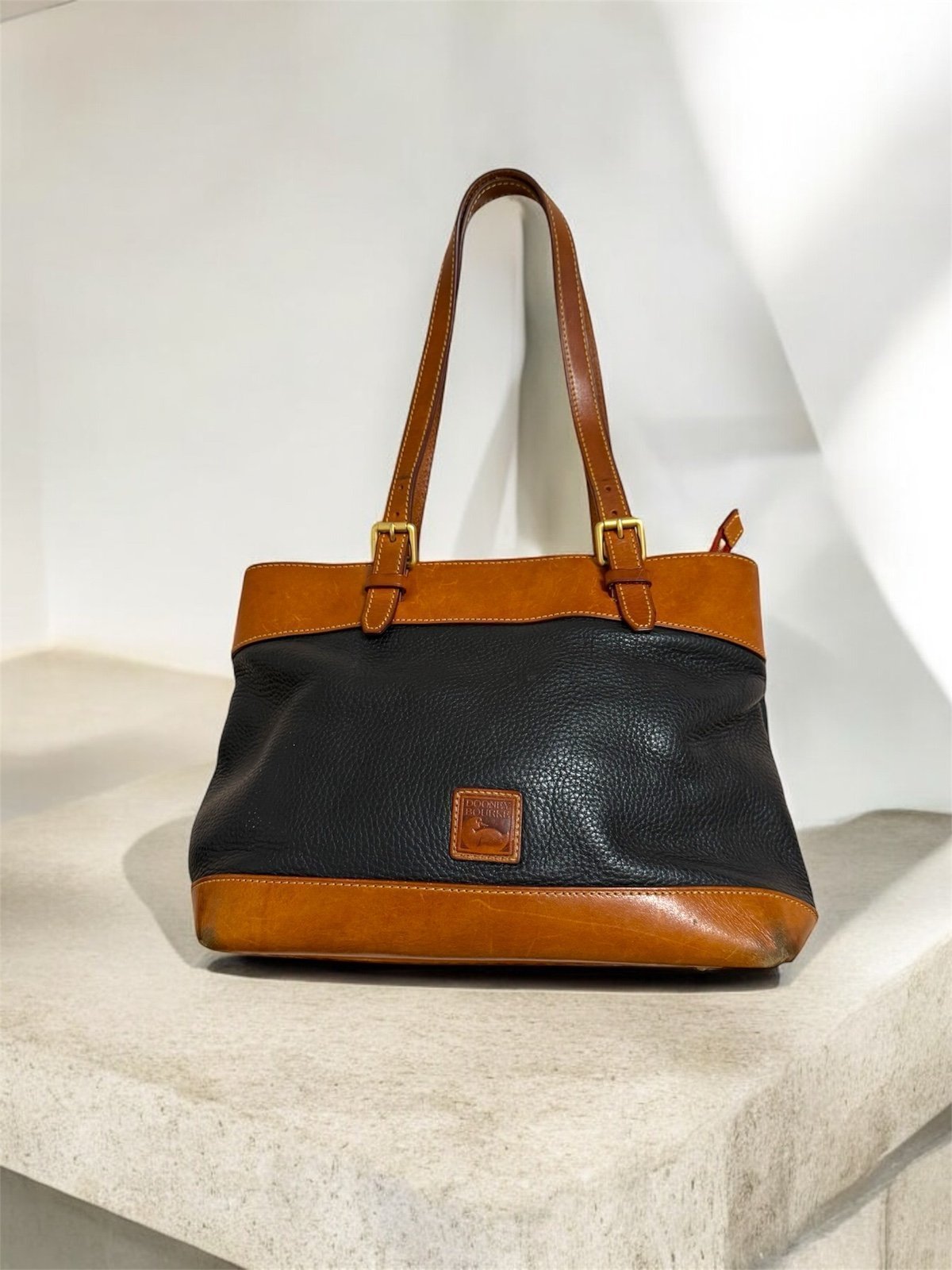 Dooney & Bourke Black and Tan Leather Tote Bag