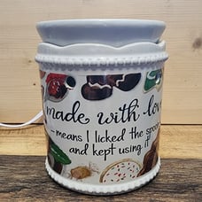 Scentsy Made With Love Wax Warmer and additional bulbs.
