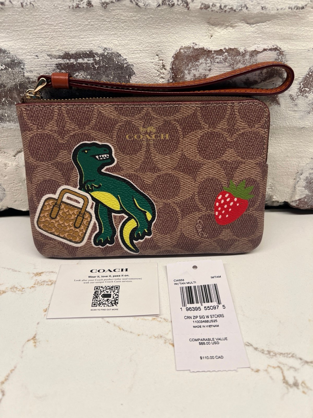 Coach Corner Zip Wristlet In Signature Canvas With Sticker Print CW856