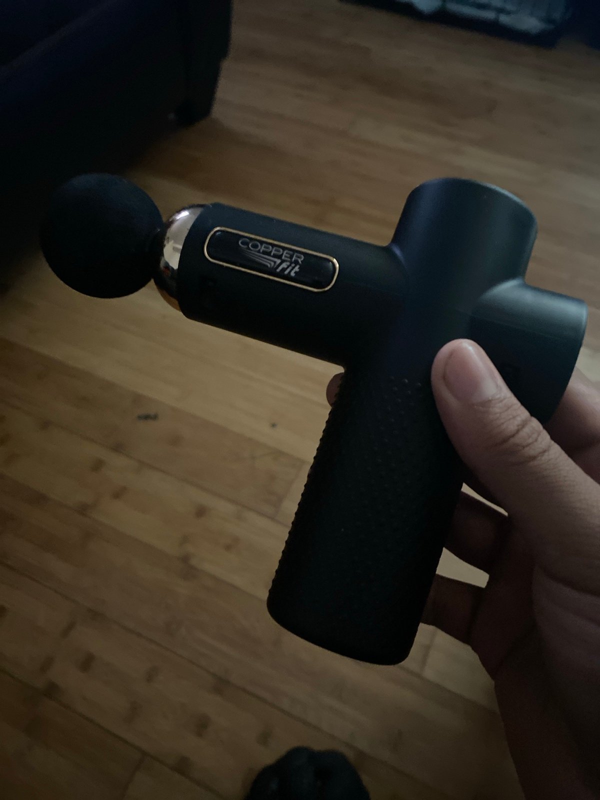mini massage gun with 4 different speeds and its travel size