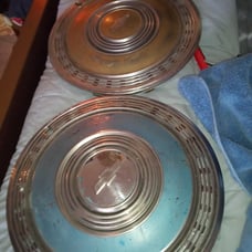 2-15 Chevy caprice hubcaps