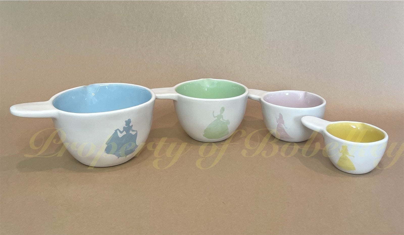 Rae Dunn princess measuring cups with handle