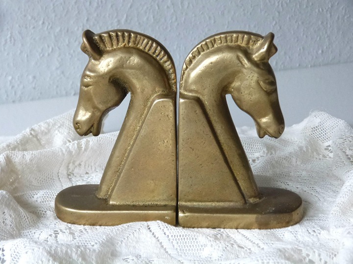 Brass bookends with horse head in Art Deco