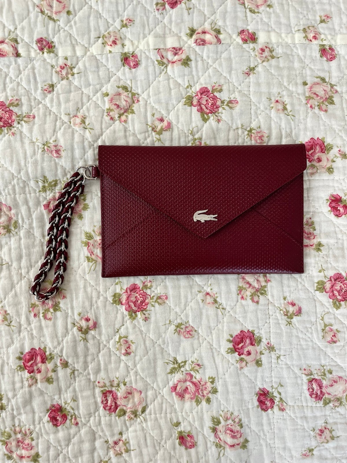 red lacoste wristlet