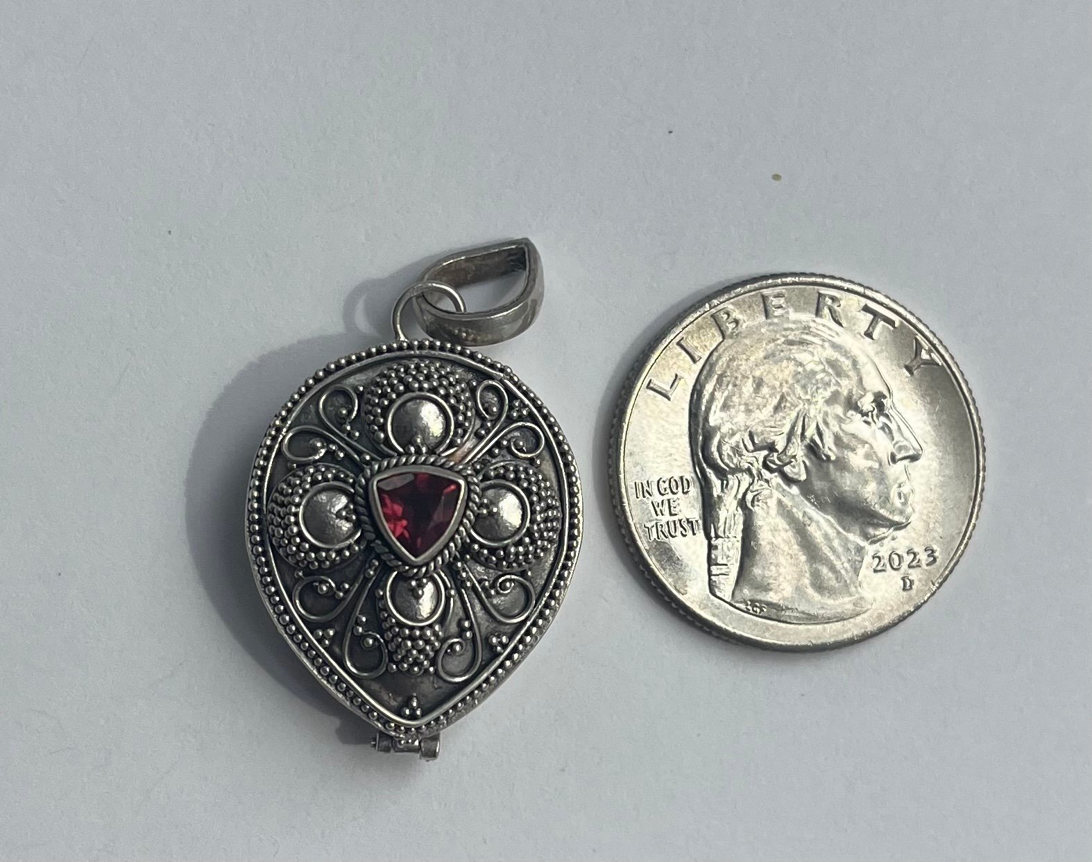 Solid silver pill box gothic pendant with garnet