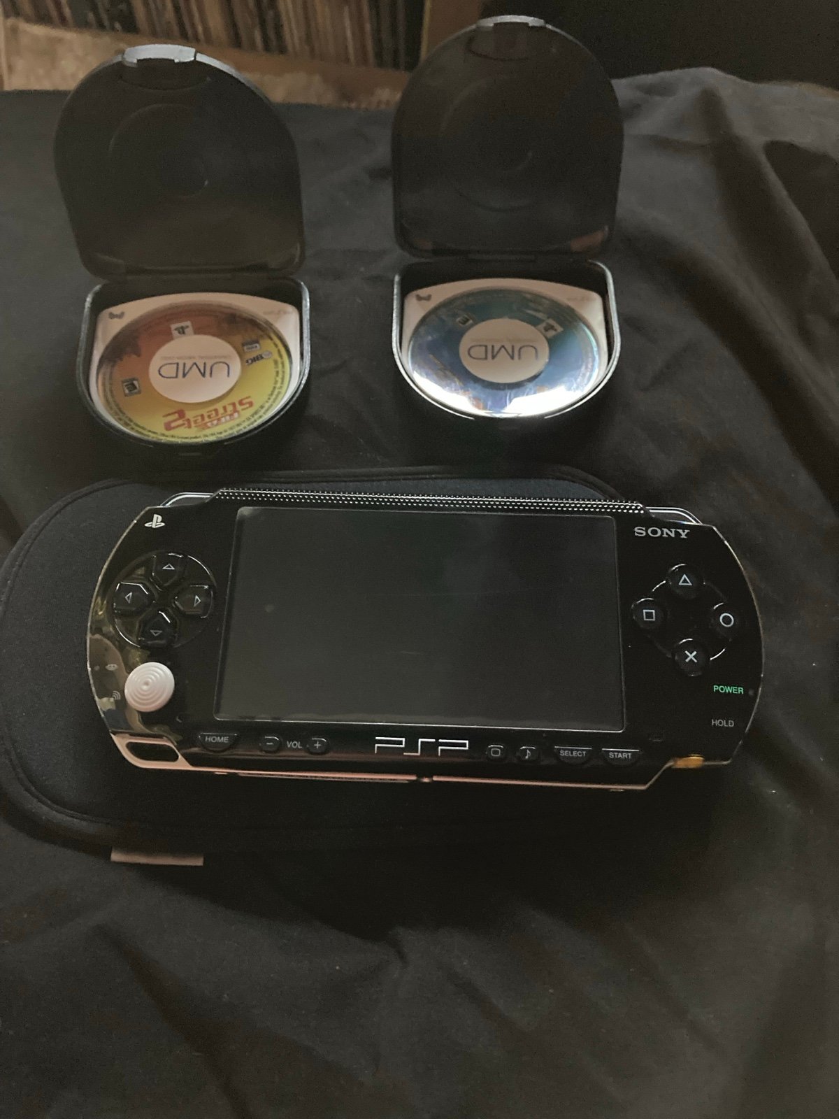 Sony PlayStation Portable(PSP) Includes soft Case and games “FIFA Streets/ ATV”