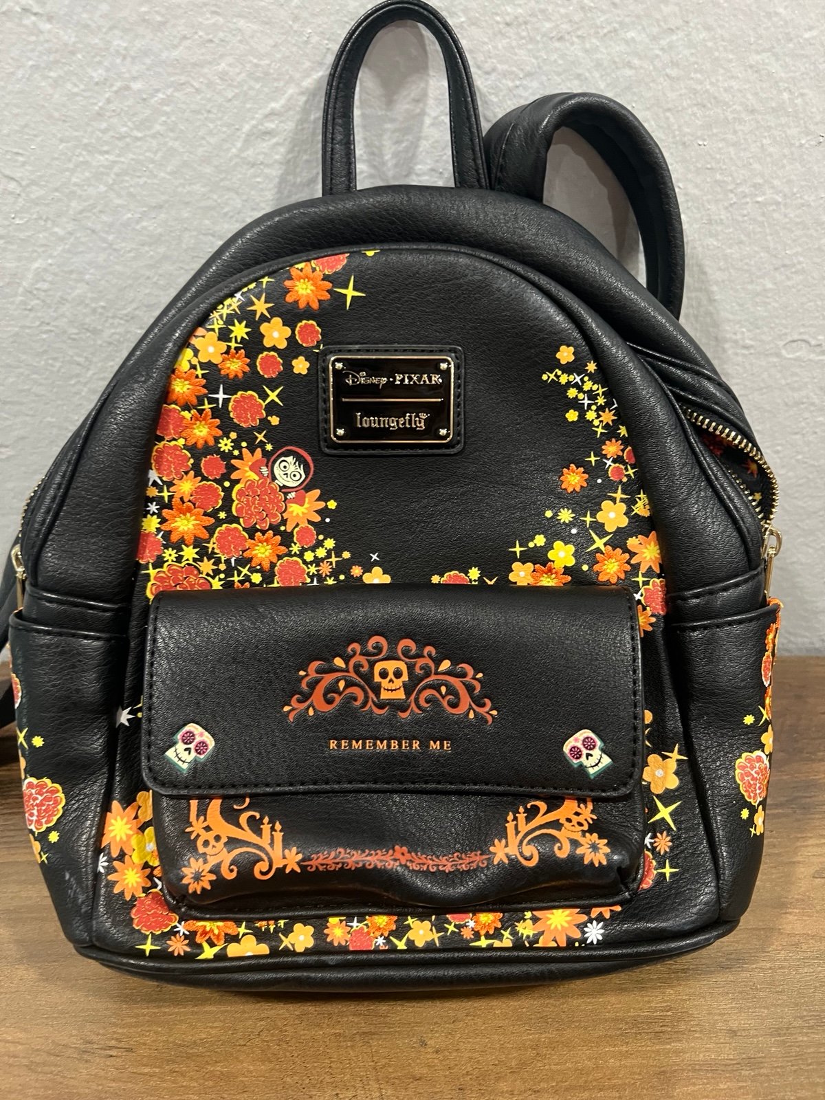 Loungefly Disney Pixar Coco “Remember Me” Mini Backpack