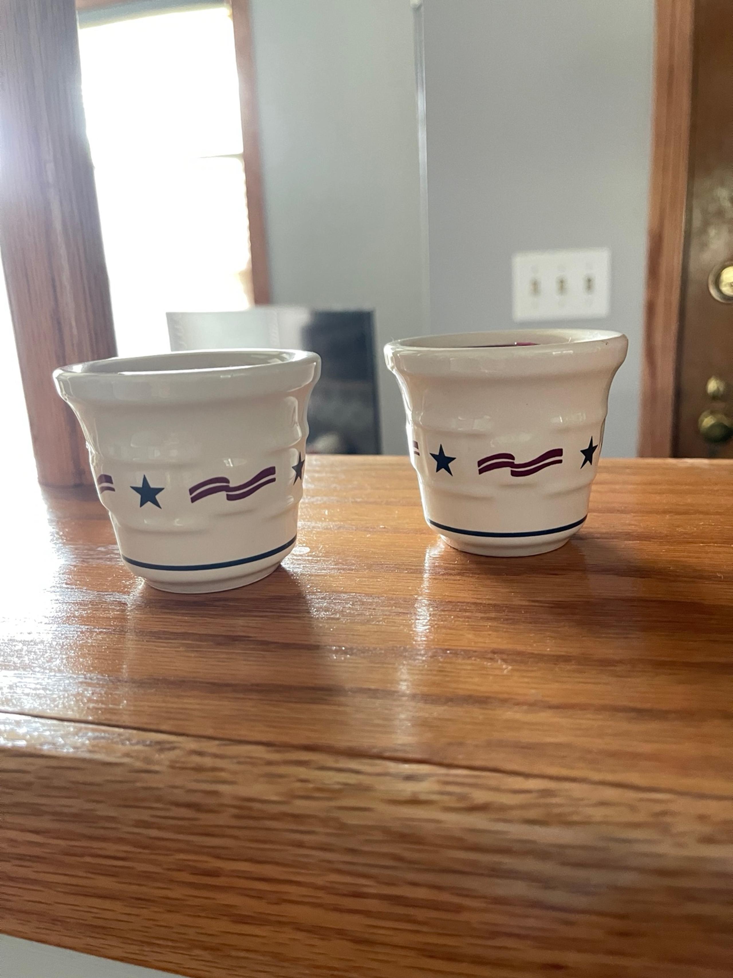 Longaberger set of two candle holders.
