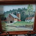 Framed painting of old barn and house.