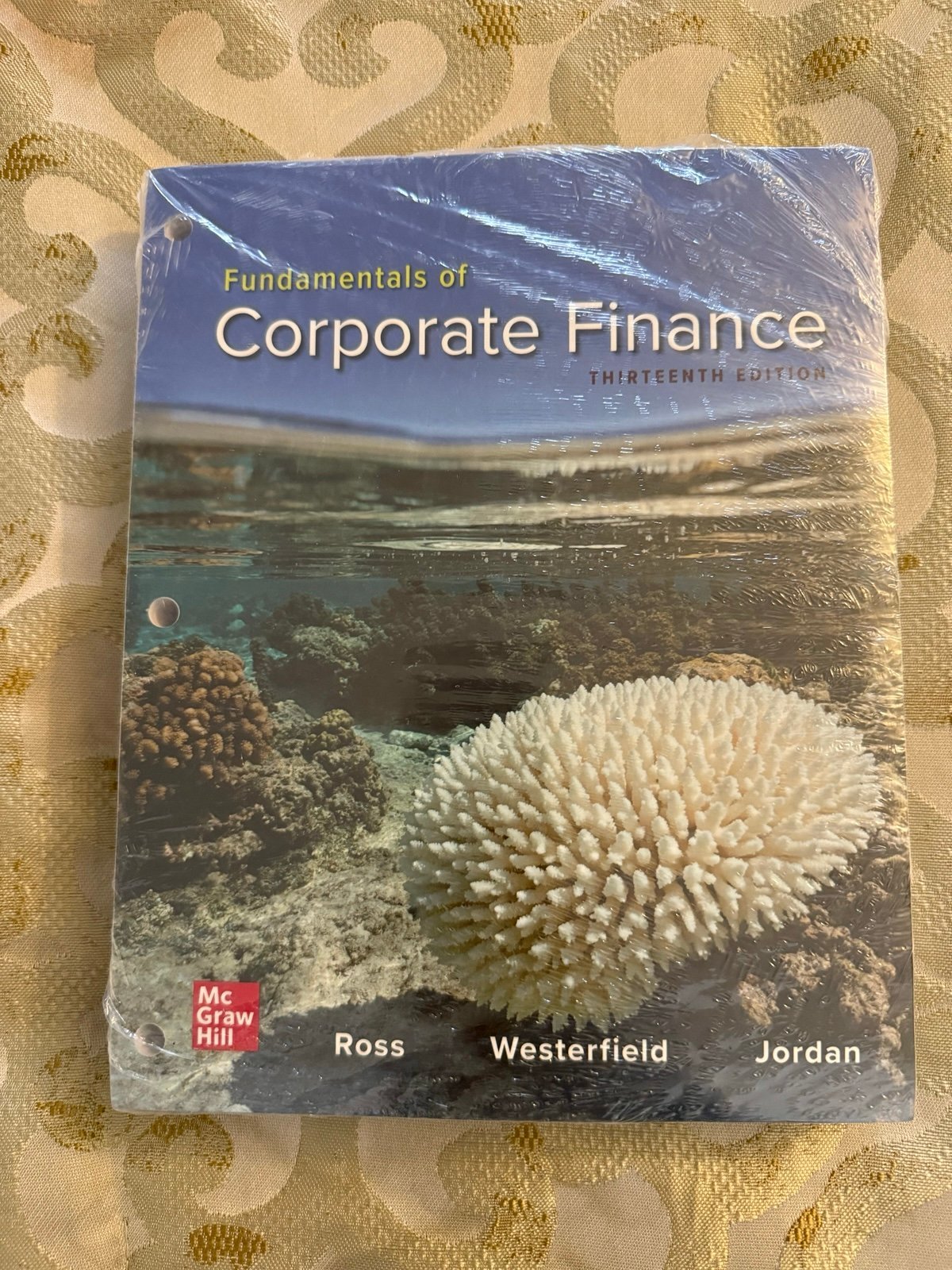 Fundamentals of Corporate Finance Thirteenth Edition loose leaf binder