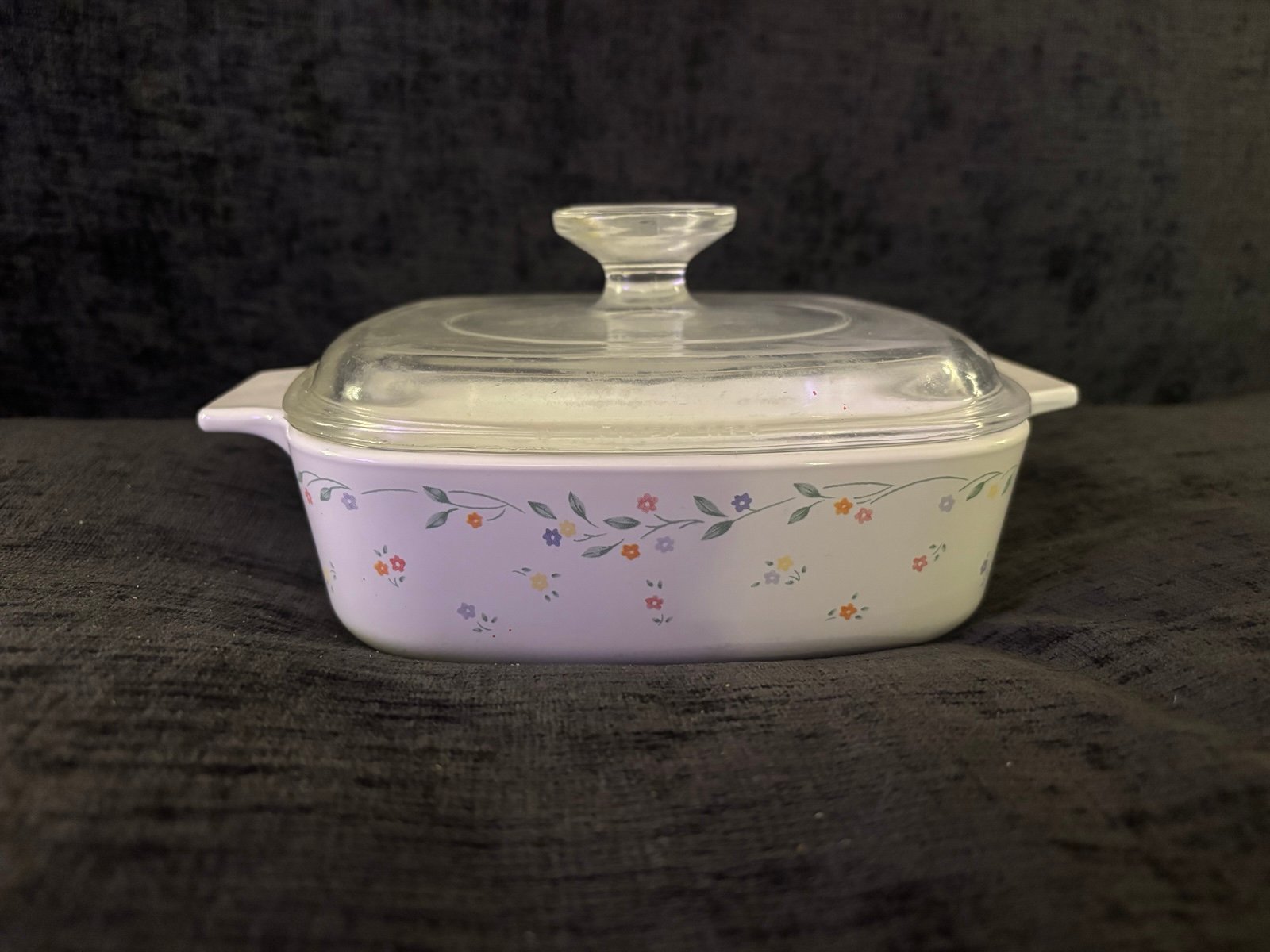 vintage CorningWare casserole dish with the English Meadow pattern,