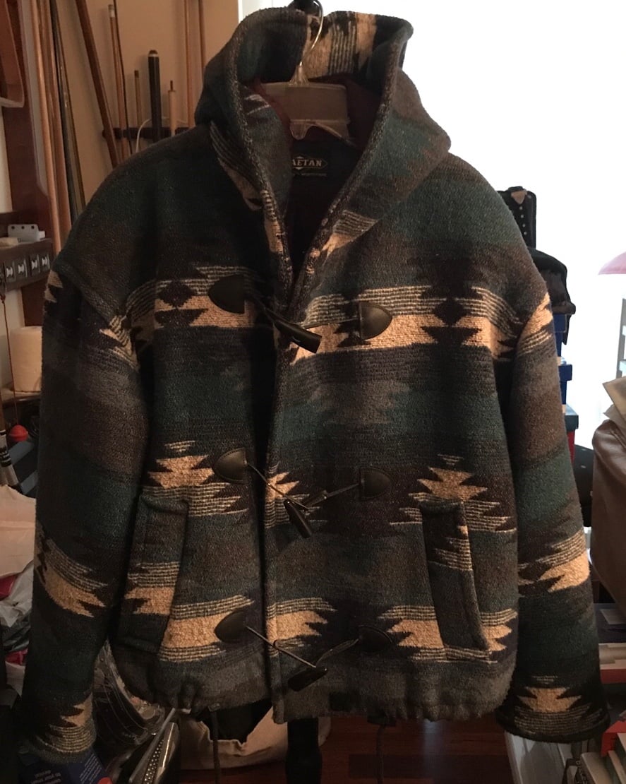 Very nice vintage coat, nice colors, hood and lined inside and the pockets