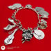 Vtg Sterling Silver Charm Bracelet with 11.5 Sterling Silver Charms. 60s & 70s.