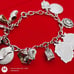 Vtg Sterling Silver Charm Bracelet with 11.5 Sterling Silver Charms. 60s & 70s.