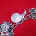 Vtg Sterling Silver Charm Bracelet with 11.5 Sterling Silver Charms. 60s & 70s.