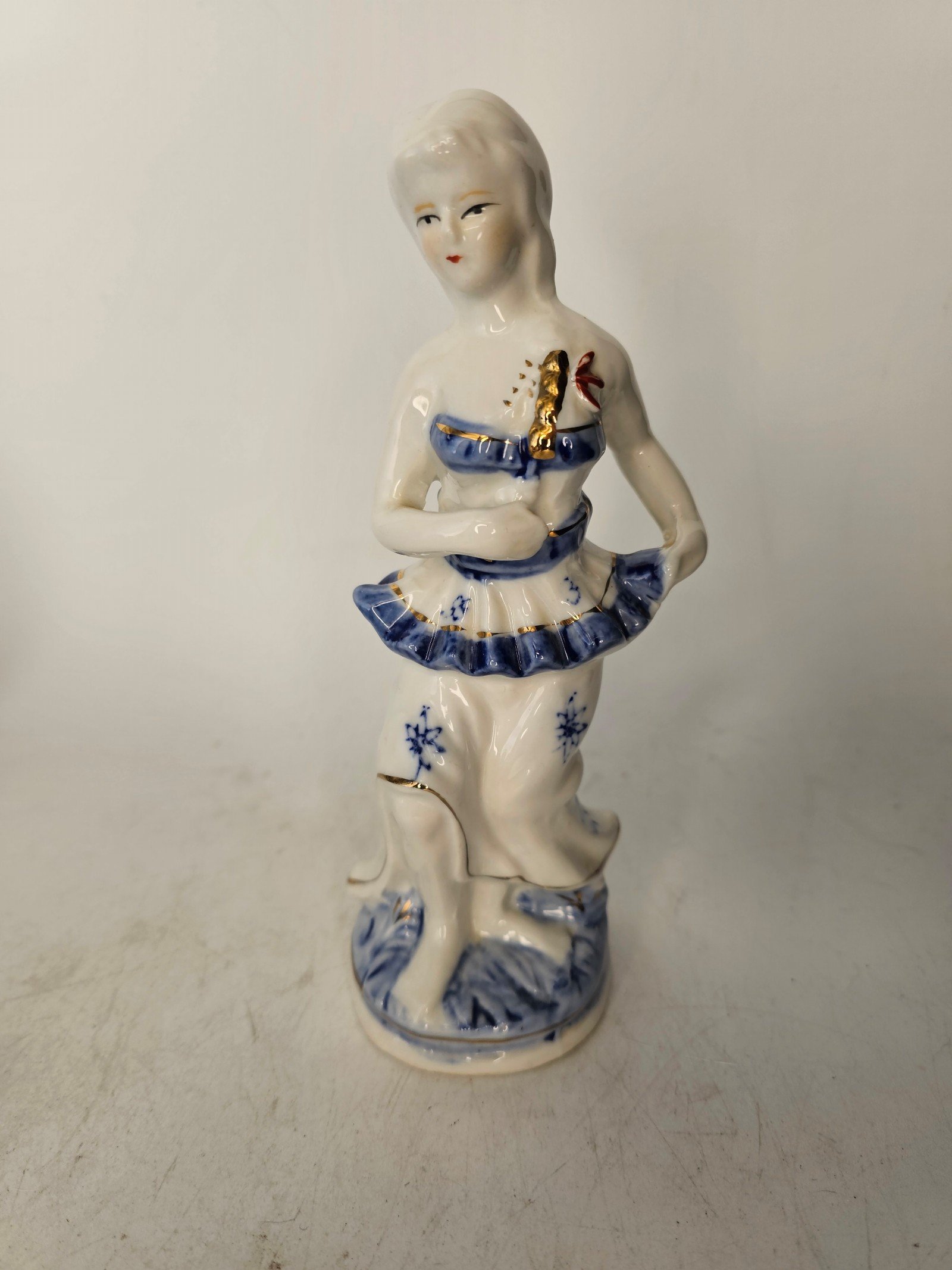 Blue and white victorian woman  figurine