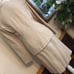 Lew Magram tan professional career skirt suit 6