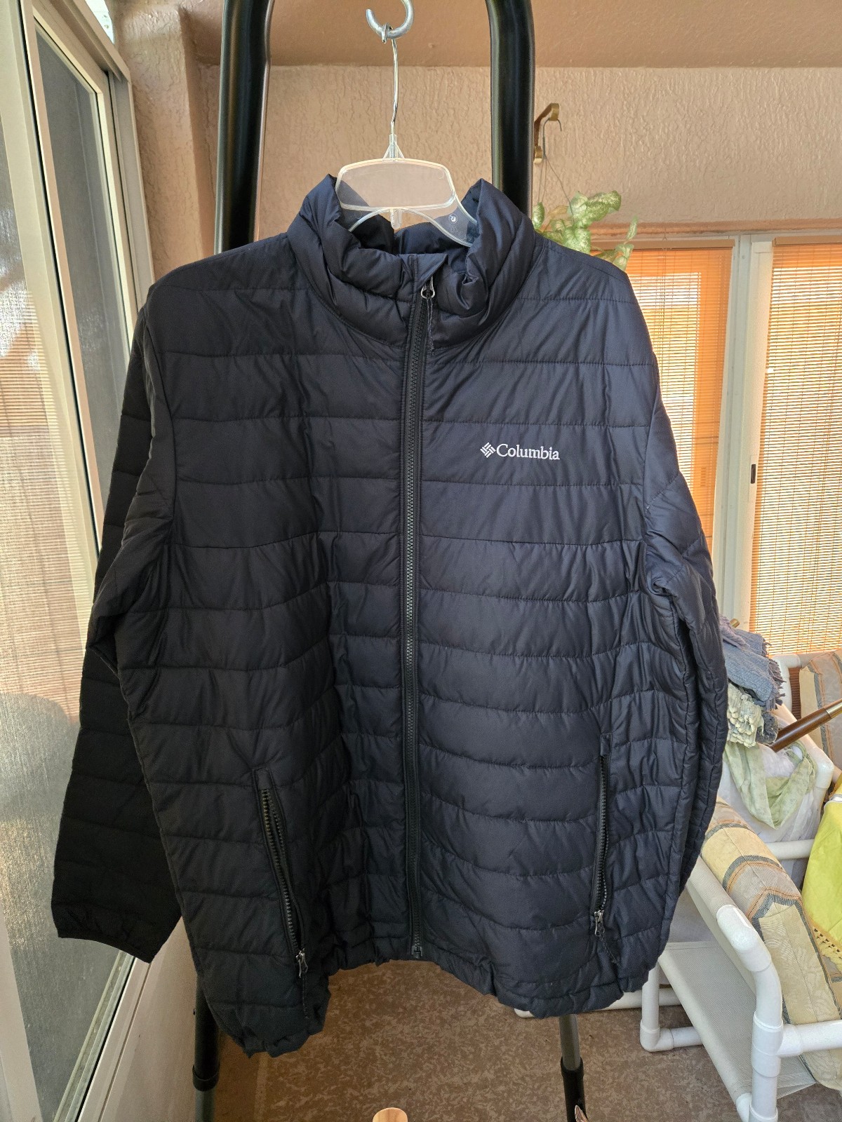 Black Columbia omniheat thermal coil puffer zipper jacket.