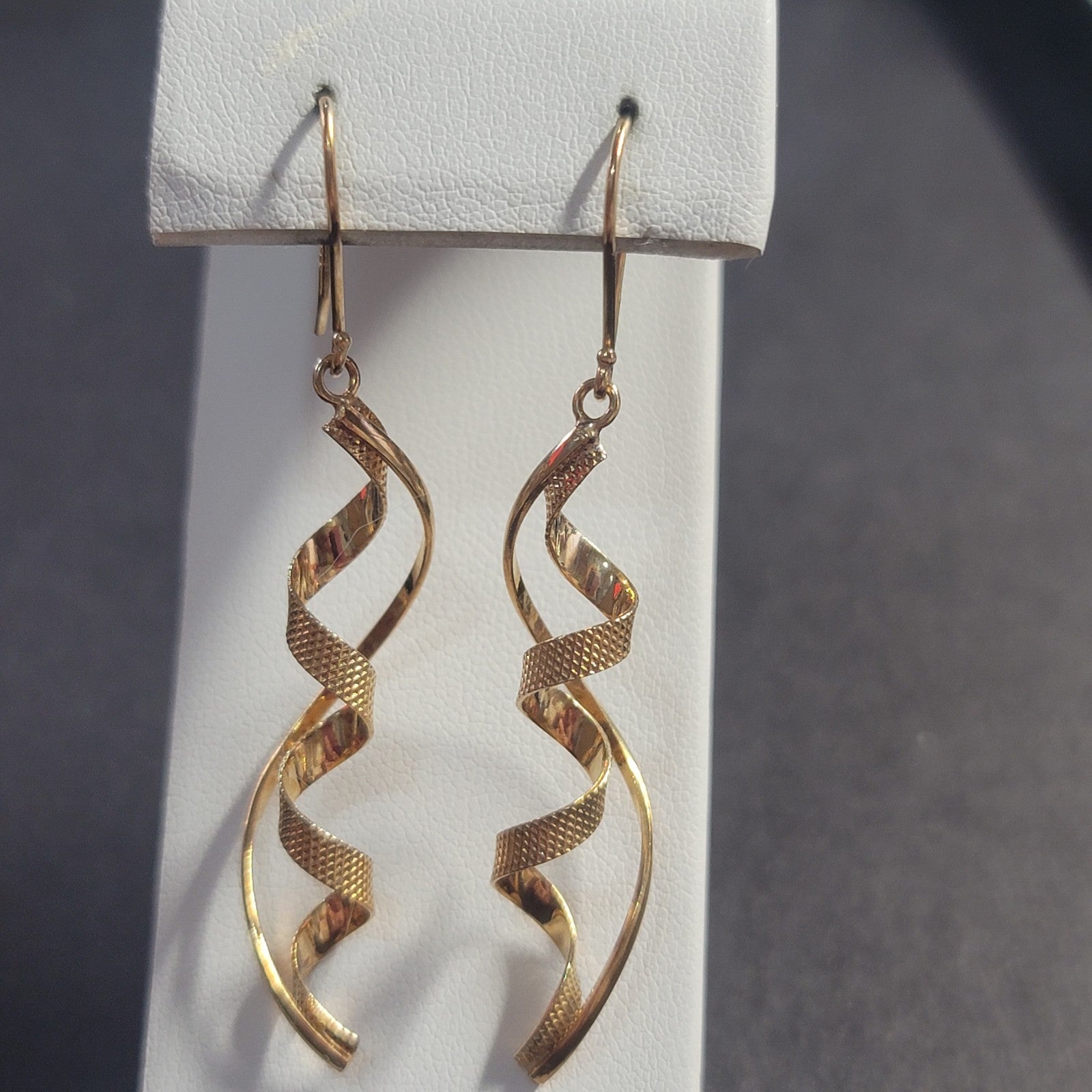 E130 Shiny Gold Spiral Earrings