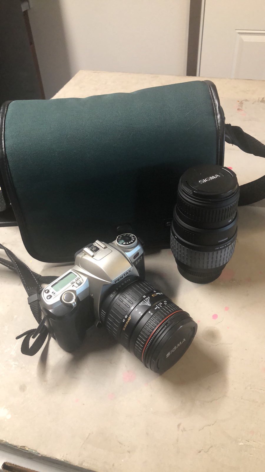 Pentax SLR film camera with two sigma lenses