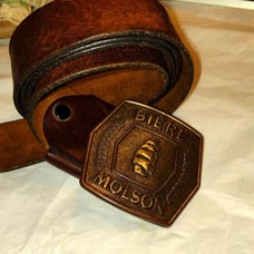 Vintage 40 inch brown leather belt made in Quebec with belt buckle