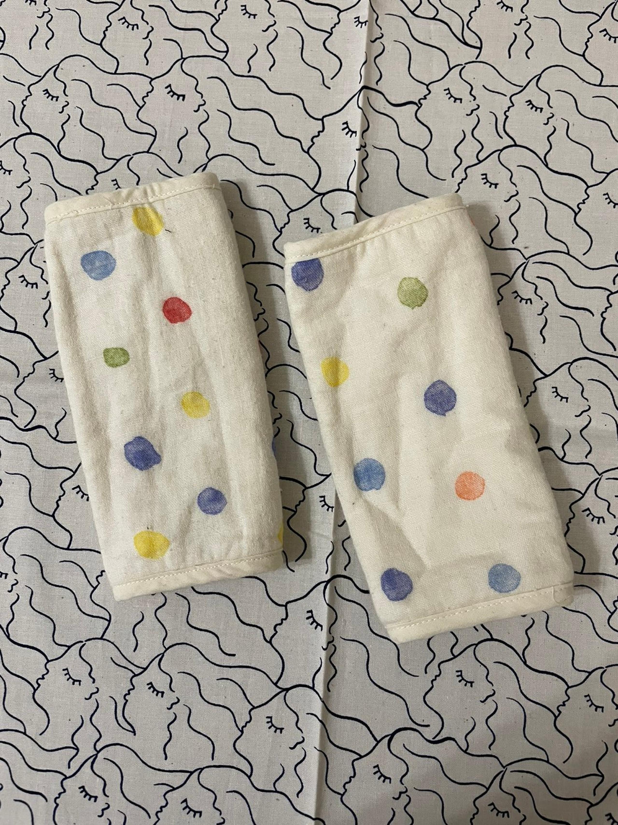 Japan Baby carrier strap protector by Naomi Ito