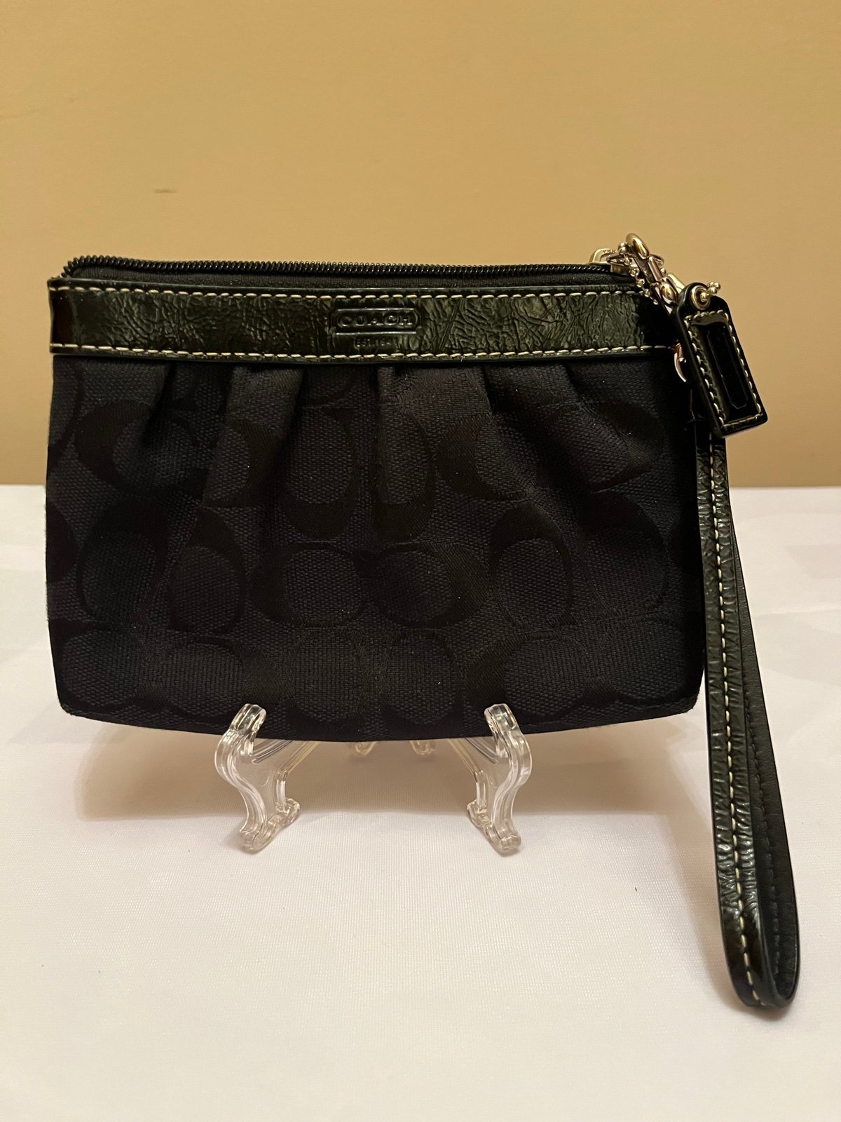 Coach signature makeup bag/wristlet (color black)