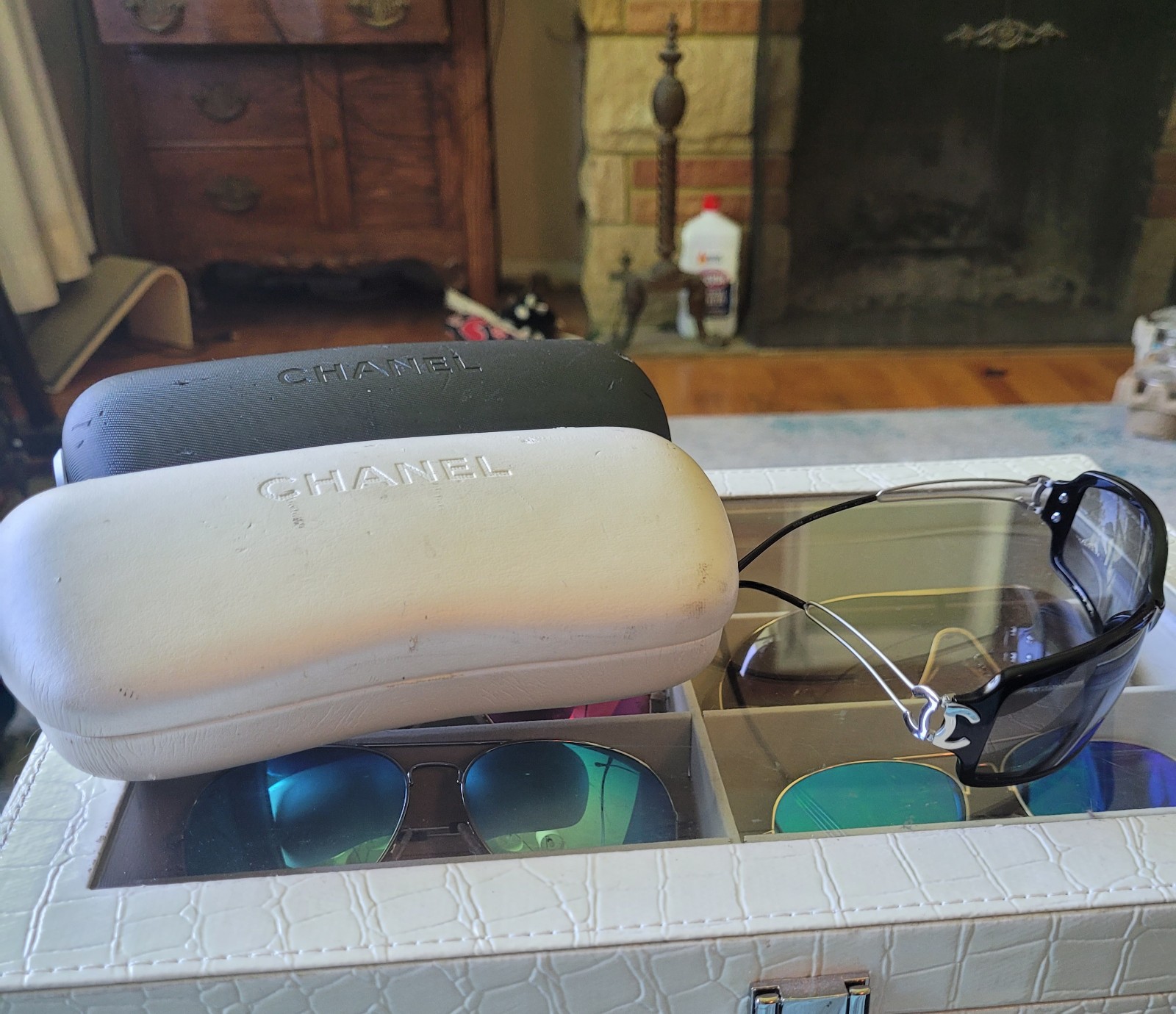 Authentic Chanel sunglasses and 2 cases