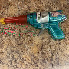 Super triple o gun tin space gun rare
