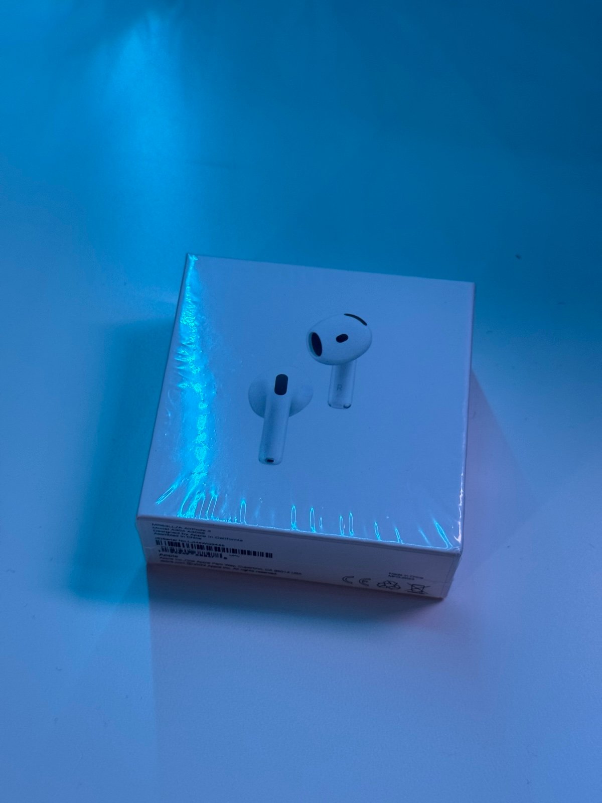 AirPods 4, brand new.