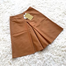 Unused with tags, Sybilla wool short pants, orange, size M.