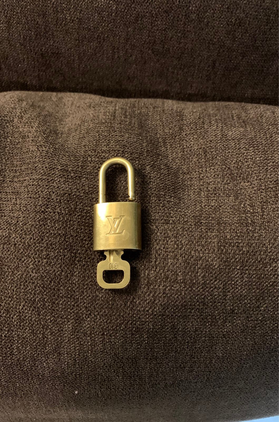 Louis Vuitton padlock closure shoulder b
