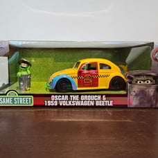 Sesame Street Oscar The Grouch Figure & 1959 Volkswagen Beetle Diecast Car Set