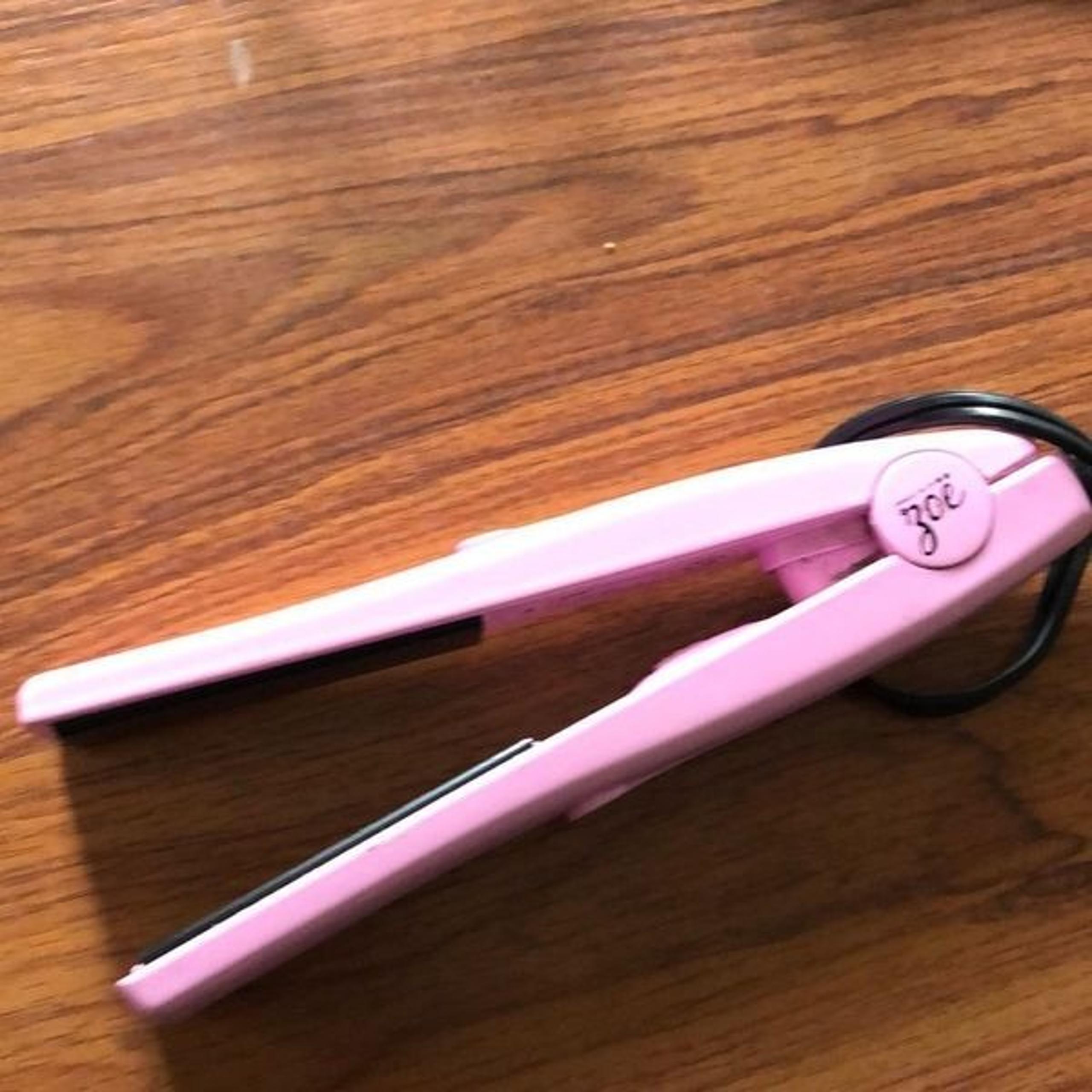 ZOE mini pink flat iron travel iron.