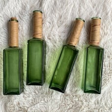 Recycled Glass Bottle With Raffia Around The Neck And Stopper 11”
